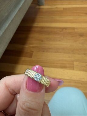 Gold Ribbed Band Ring with Sparkling Center Stone